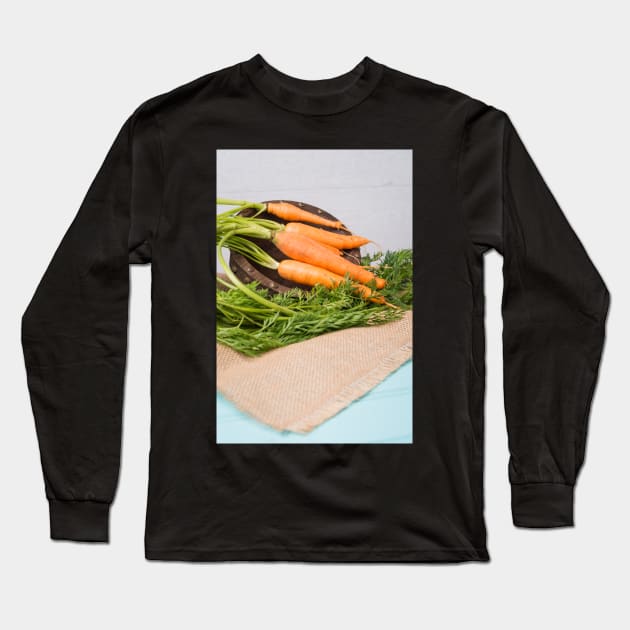 Carrots on a wooden table Long Sleeve T-Shirt by homydesign